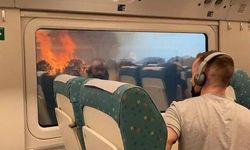 Alevlerin arasından geçen trenin yolcuları ölümden döndü